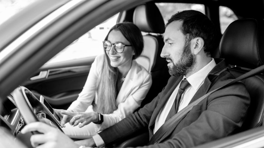 Couple driving a car